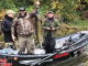 Jan Hrdlicka (front center) holds a Chinook salmon on the Oswego River. Looking on are Olaf Jochmann, back left and Capt. Kevin Davis, right. Photos courtesy of Catch the Drift and Chasin' Tail Adventures guide services.