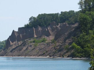 The 597-acre, minimally developed Chimney Bluffs State Park lies along Lake Ontario’s shoreline and features numerous tall pillars of rock for which it was named.