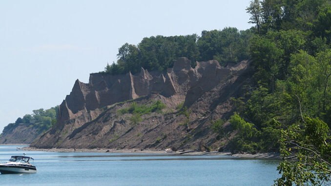 The 597-acre, minimally developed Chimney Bluffs State Park lies along Lake Ontario’s shoreline and features numerous tall pillars of rock for which it was named.