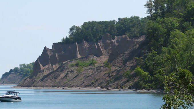 ChimneyBluffs The 597-acre, minimally developed Chimney Bluffs State Park lies along Lake Ontario’s shoreline and features numerous tall pillars of rock for which it was named.