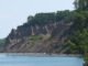 The 597-acre, minimally developed Chimney Bluffs State Park lies along Lake Ontario’s shoreline and features numerous tall pillars of rock for which it was named.