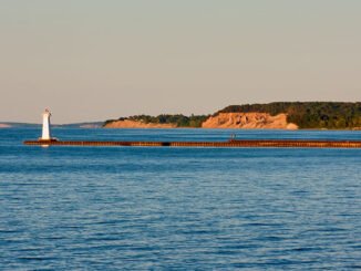 Sodus Point Beach Park in Sodus Point features a sandy lakefront, along with a walk on the lighthouse pier.